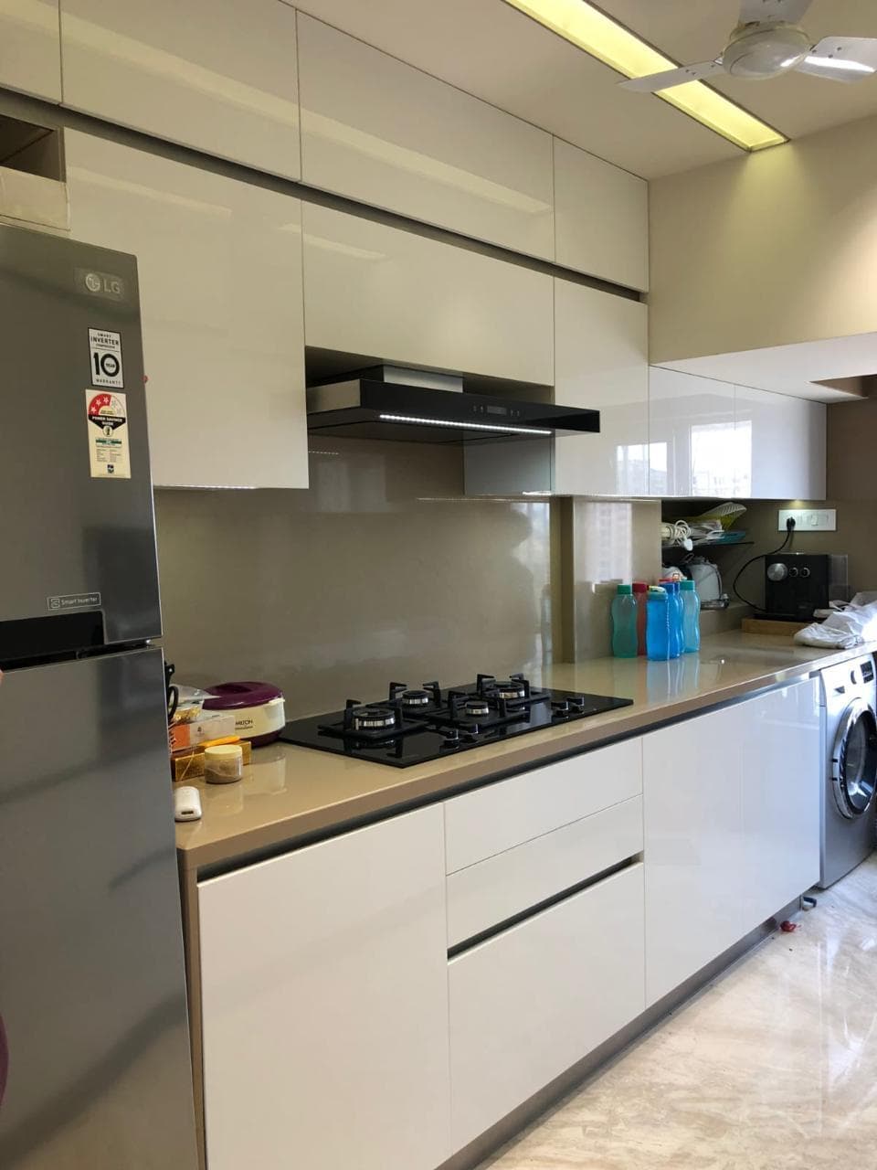 Gloss modular kitchen completed in Mumbai by Shree Jeteshwar Steel Arts